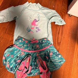 Swim shirt, swim skirt size 5 and matching water shoes size 9